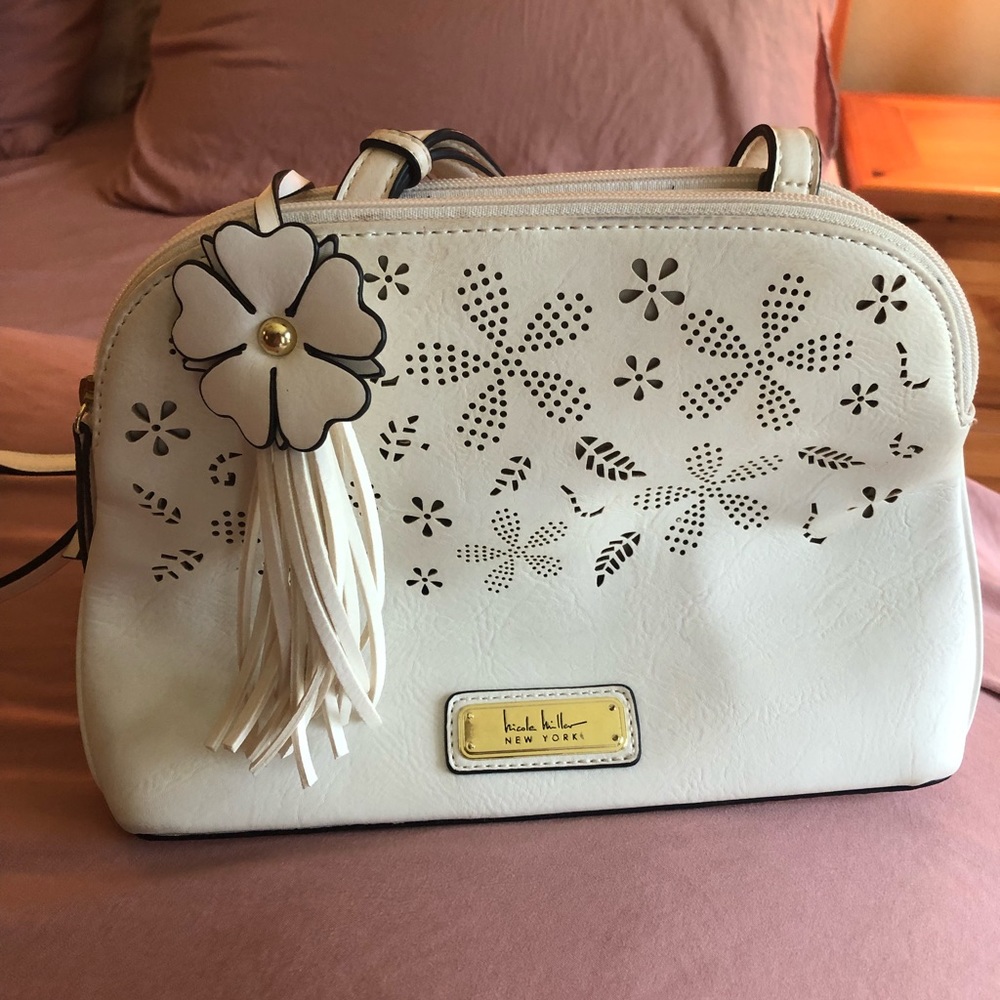 Nicole Miller bag. White leather crossbody strap. Smoke free pet free home.